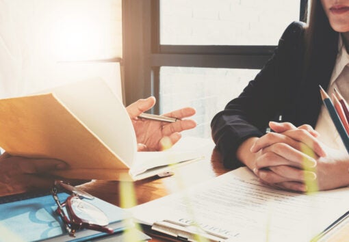 Business professionals. Close up group of young confident business people analyzing data in office