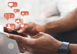 Social media. Man holding smartphone, connecting to internet and chatting