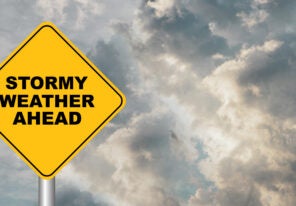 stormy weather sign against cloudy sky