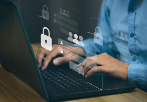 Businessmen protecting personal data on laptop and virtual inter