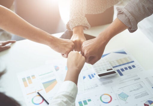 Business merger, business firms show fundraising synergies to strengthen marketing and investment. together concept