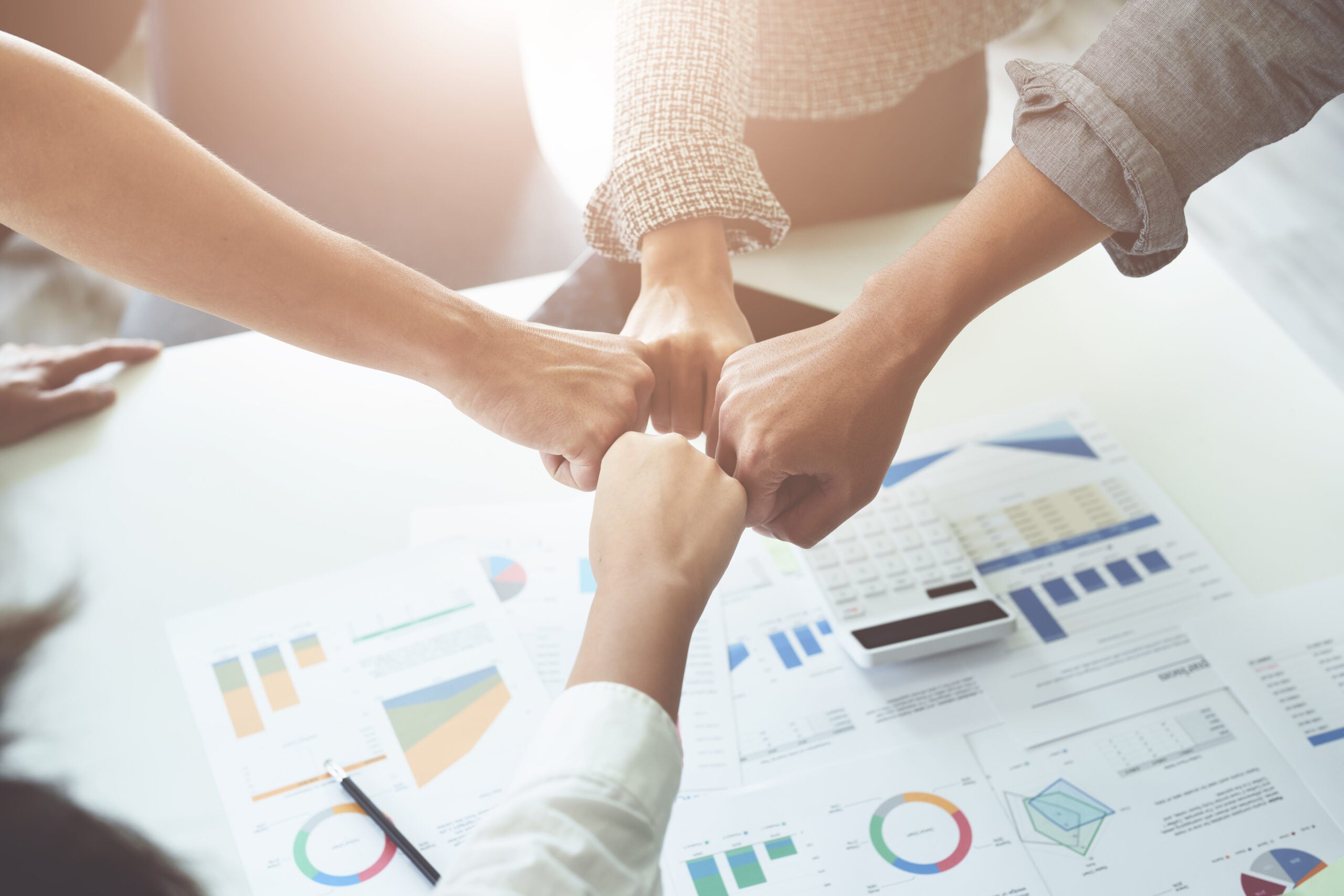 Business merger, Asian business firms show fundraising synergies to strengthen marketing and investment. together concept Business merger, business firms show fundraising synergies to strengthen marketing and investment. together concept