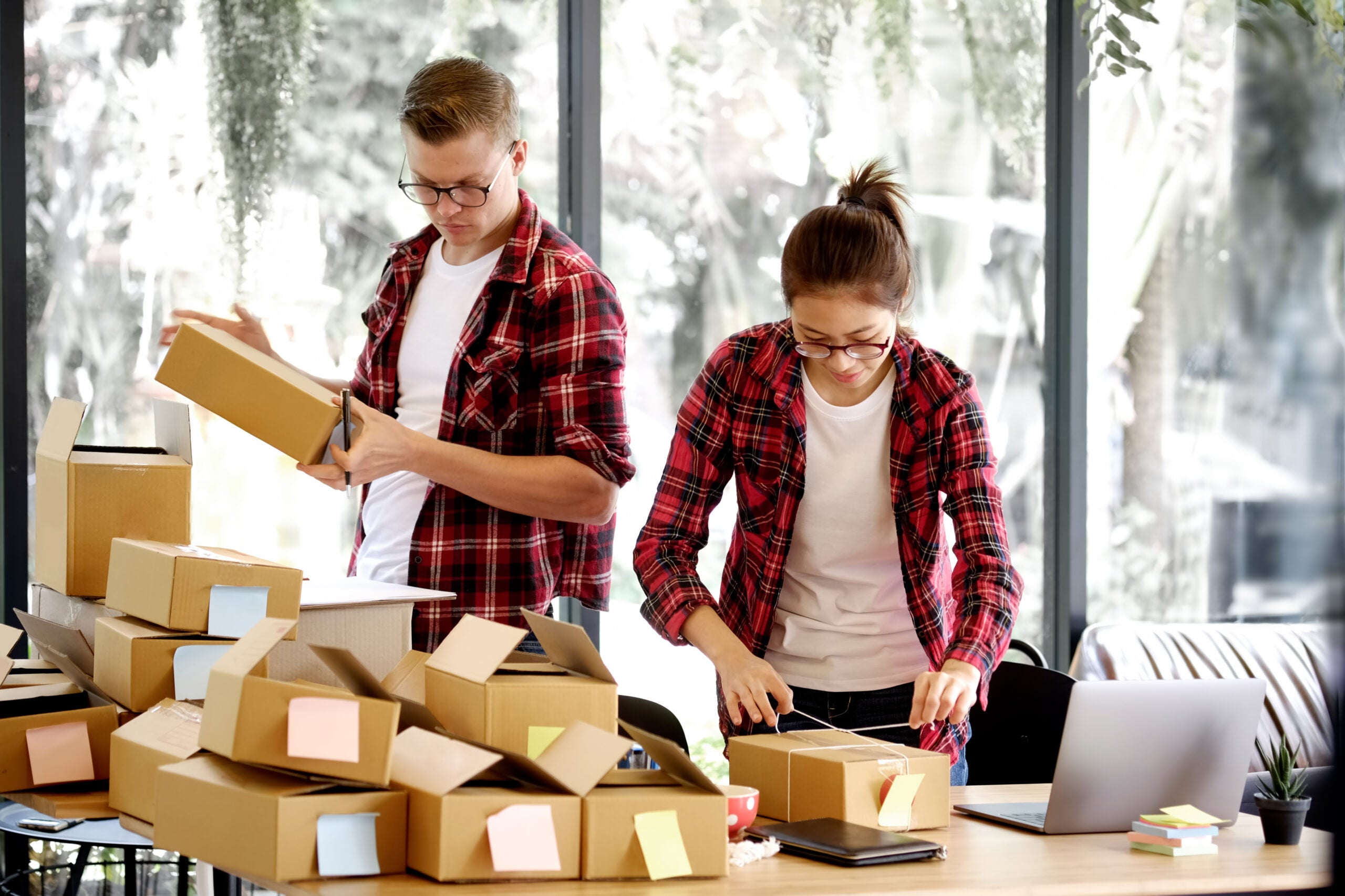 Shot of Young entrepreneur, start up teenager business SME owner work at home. Shot of Young entrepreneur, start up teenager business SME owner work at home.