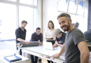 advertising agency owner and his team