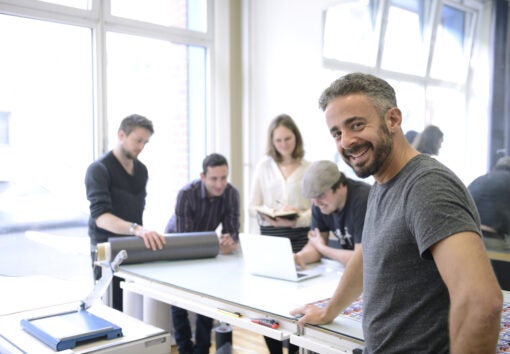 advertising agency owner and his team