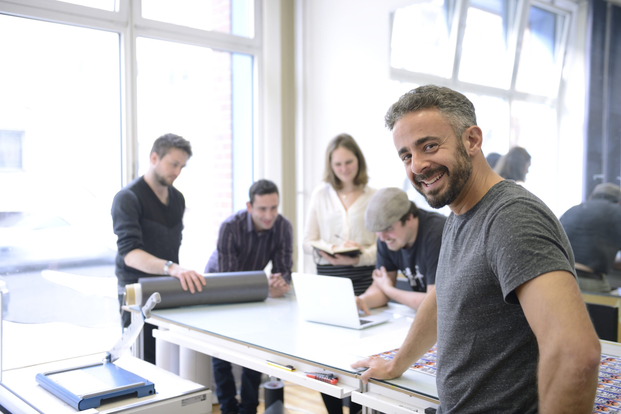 advertising agency owner and his team advertising agency owner and his team
